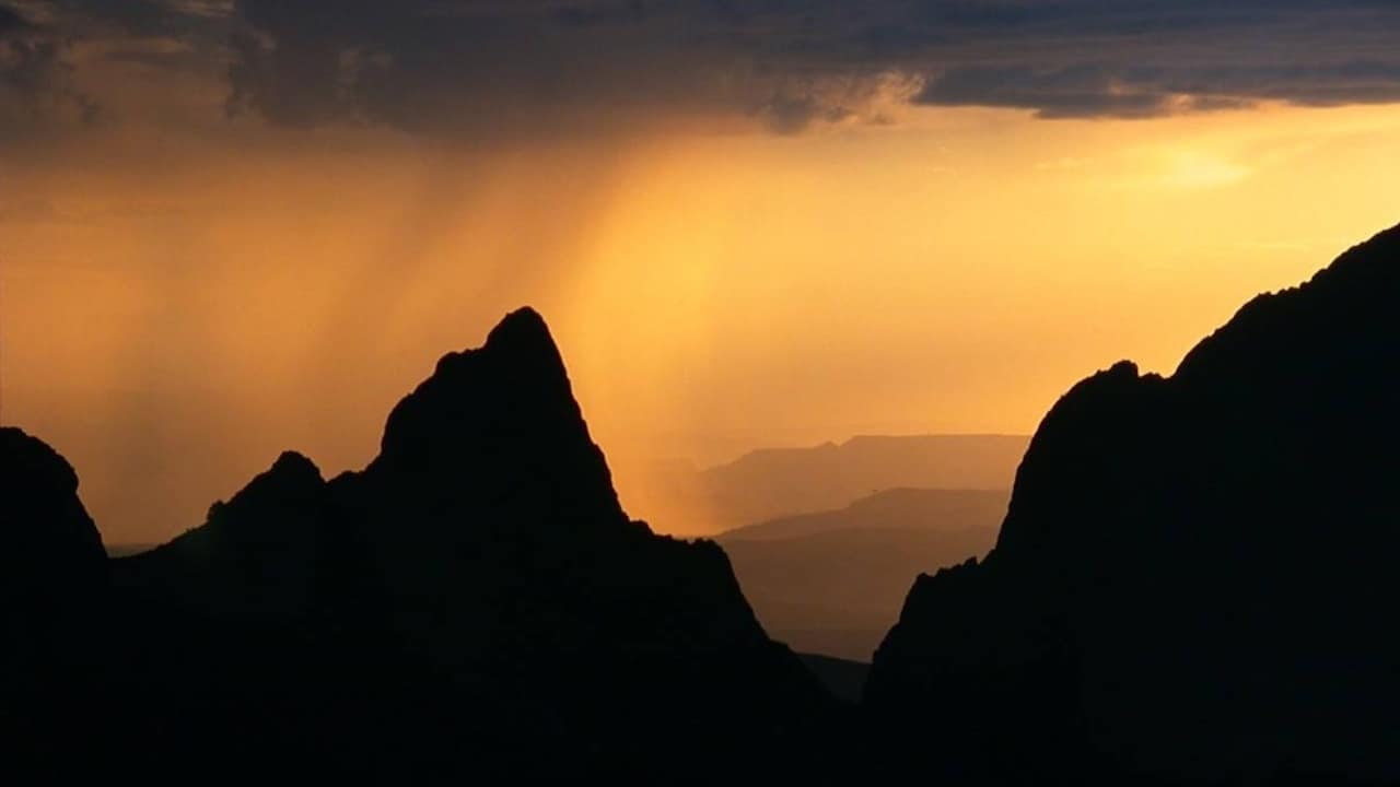 Orange sunset over the plains viewed through the Window at Big Bend National Park.