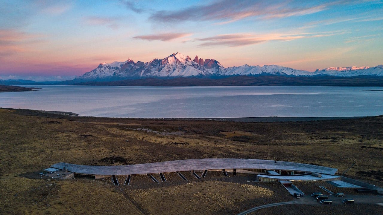 The Tierra Patagonia Hotel overlooks Lake Sarmiento, with the stunning Torres del Paine as a backdrop.