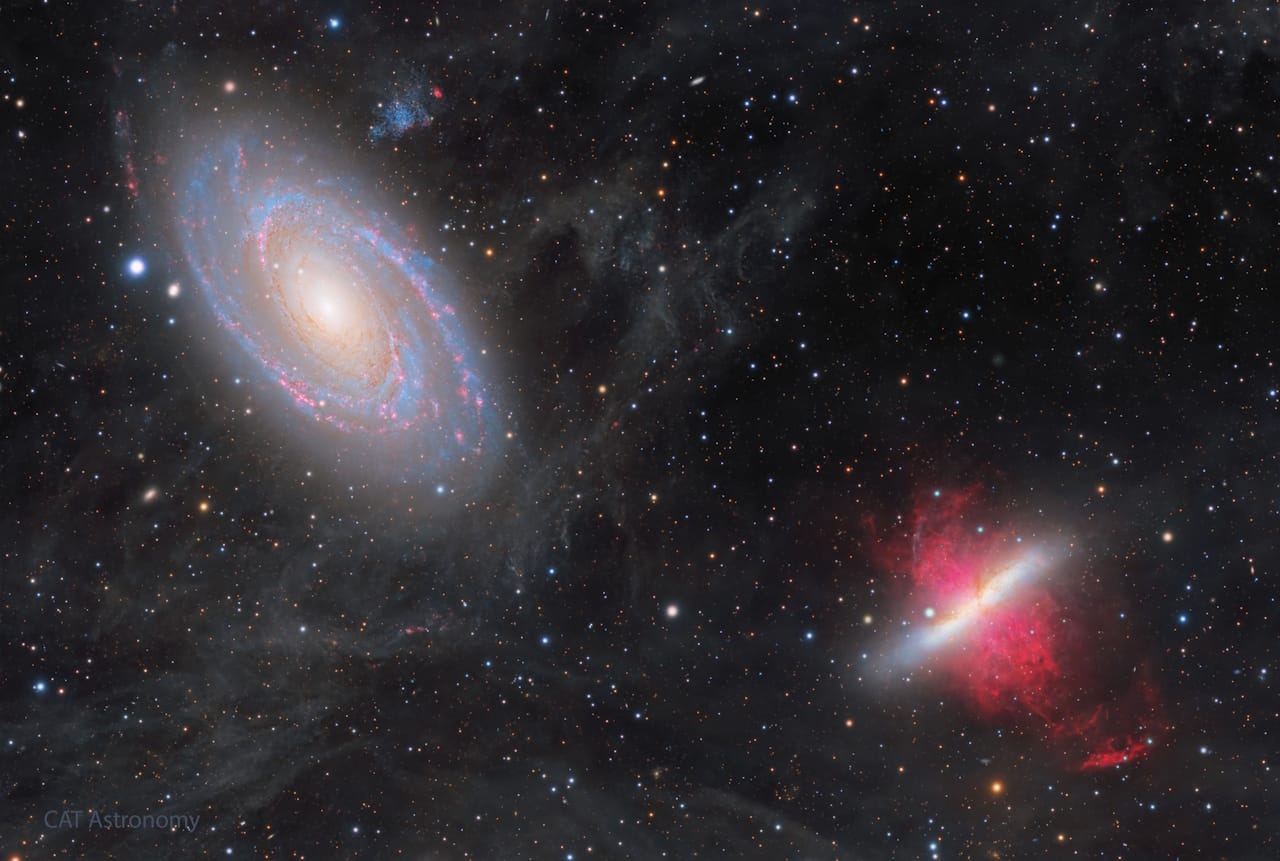 A breathtaking view of spiral galaxy M81 and irregular galaxy M82, entwined in a cosmic dance amidst a starry night sky.