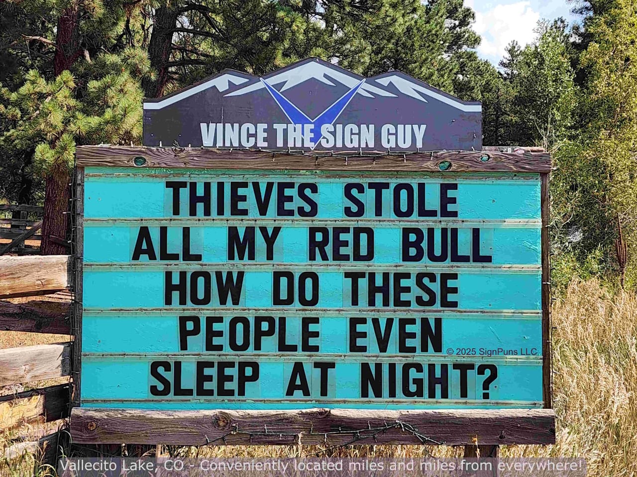 A Vince the Sign Guy sign that says "Thieves stole all my Red Bull. How do these people even sleep at night?"