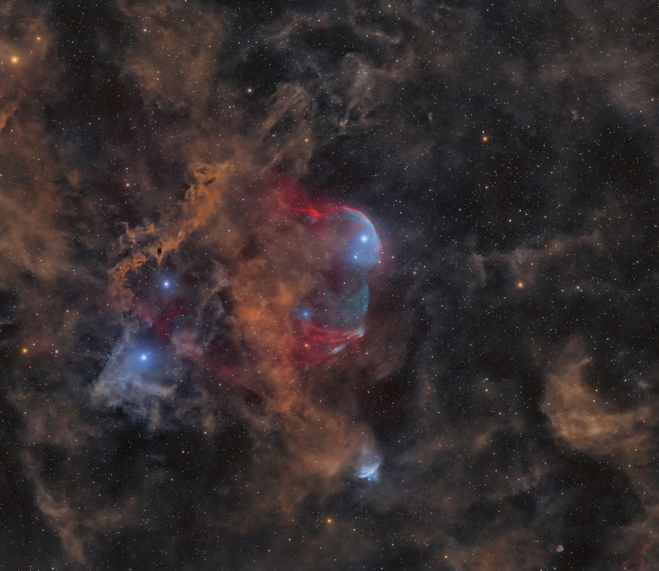 Heart of the nebula in Scorpius, showcasing supernova remnant G115.5+9.1 and a new planetary nebula candidate.