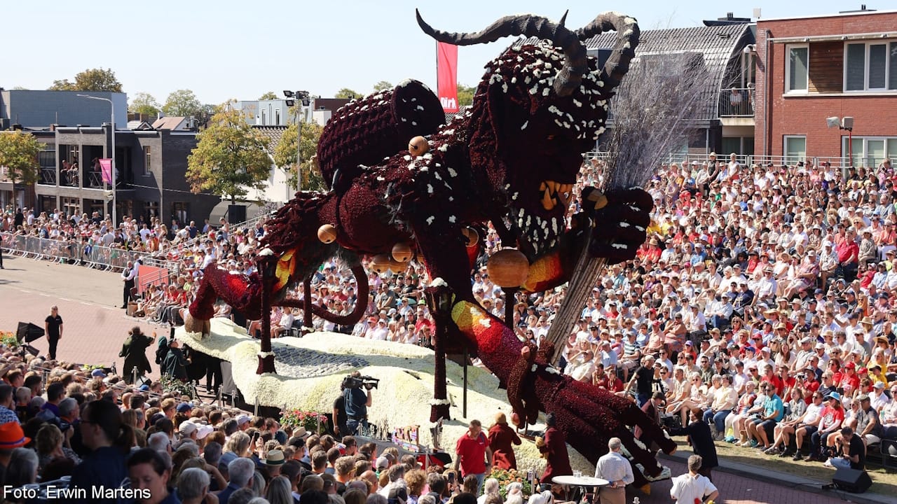 Sinister looking parade float made of Dahlias showing Krampus, the evil anti-Christmas character.